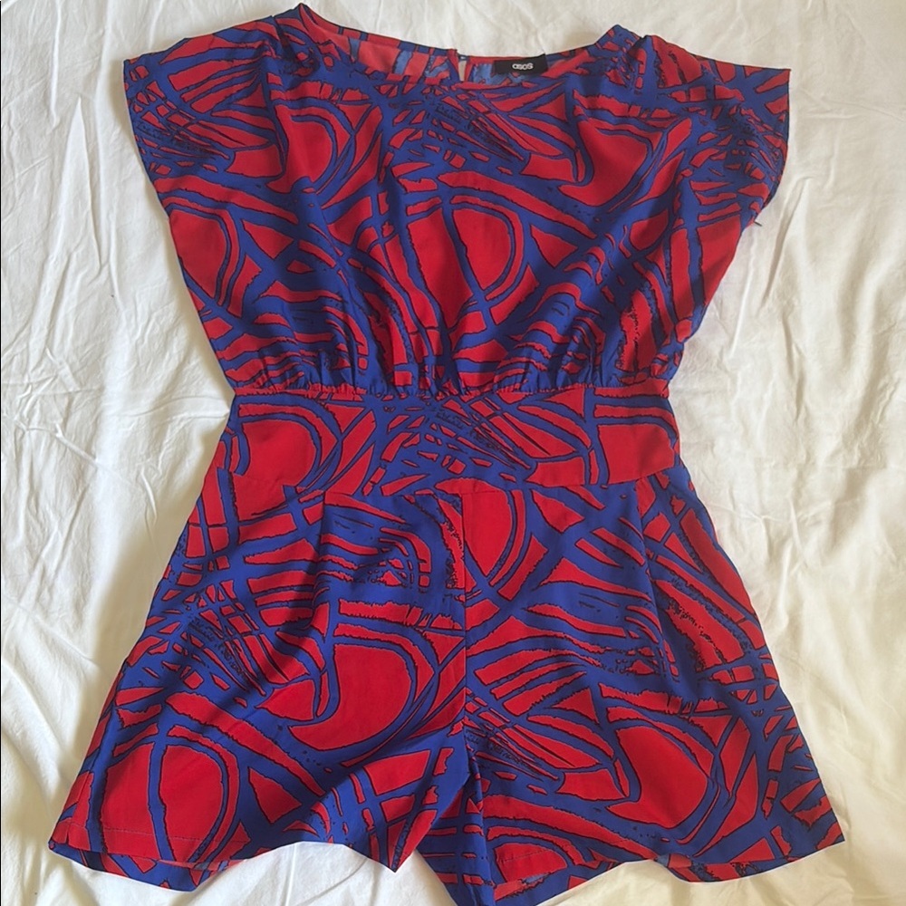 Women’s Red & Blue Patterned One-Piece Romper – Size Small. Fits waist 25-27”